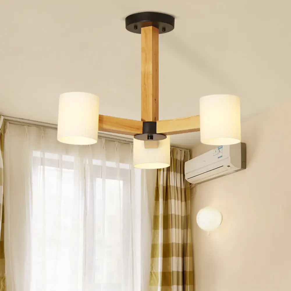 Oversized Chandeliers as a Statement Piece in Living RoomsOversized Chandeliers as a Statement Piece in Living RoomsJapanese Style Pendant Chandelier with White Glass Shade and Wood Accents for Bedroom Lighting
