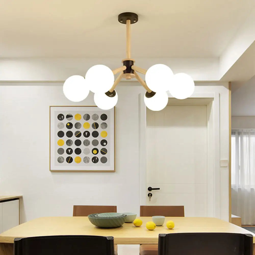 Chandeliers with Pendant Lights for a Stylish LookChandeliers with Pendant Lights for a Stylish LookModern 6-Light Grape Chandelier with Wood Branch and White Glass Chandeliers with Pendant Lights for a Stylish LookChandeliers with Pendant Lights for a Stylish LookModern 6-Light Grape Chandelier with Wood Branch and White Glass