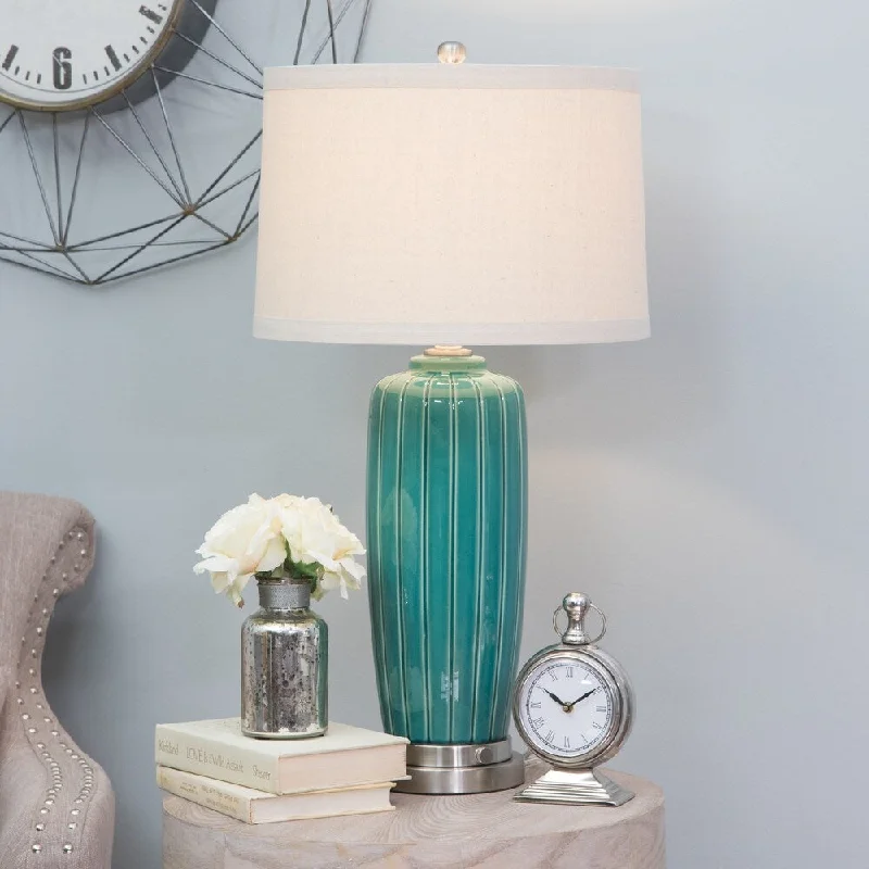 wooden table lamps with natural grain for a warm and organic feelwooden table lamps with natural grain for a warm and organic feelErika Green Ceramic Table Lamp