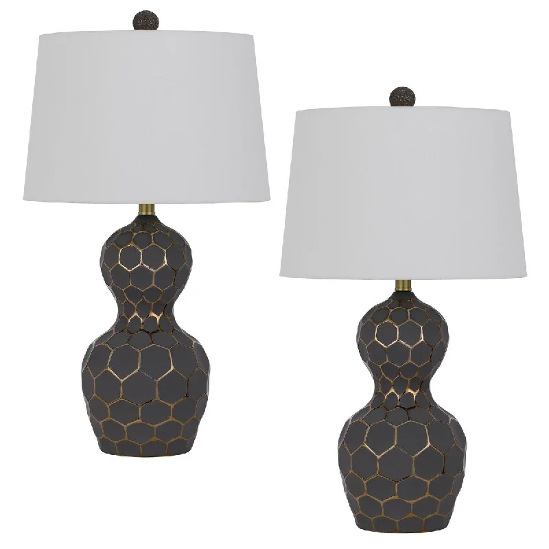 metal table lamps with a matte black finish for a sleek appearancemetal table lamps with a matte black finish for a sleek appearanceTuscaloosa 26.75" Height Resin Lamp Set in Matte Black/Gold Finish